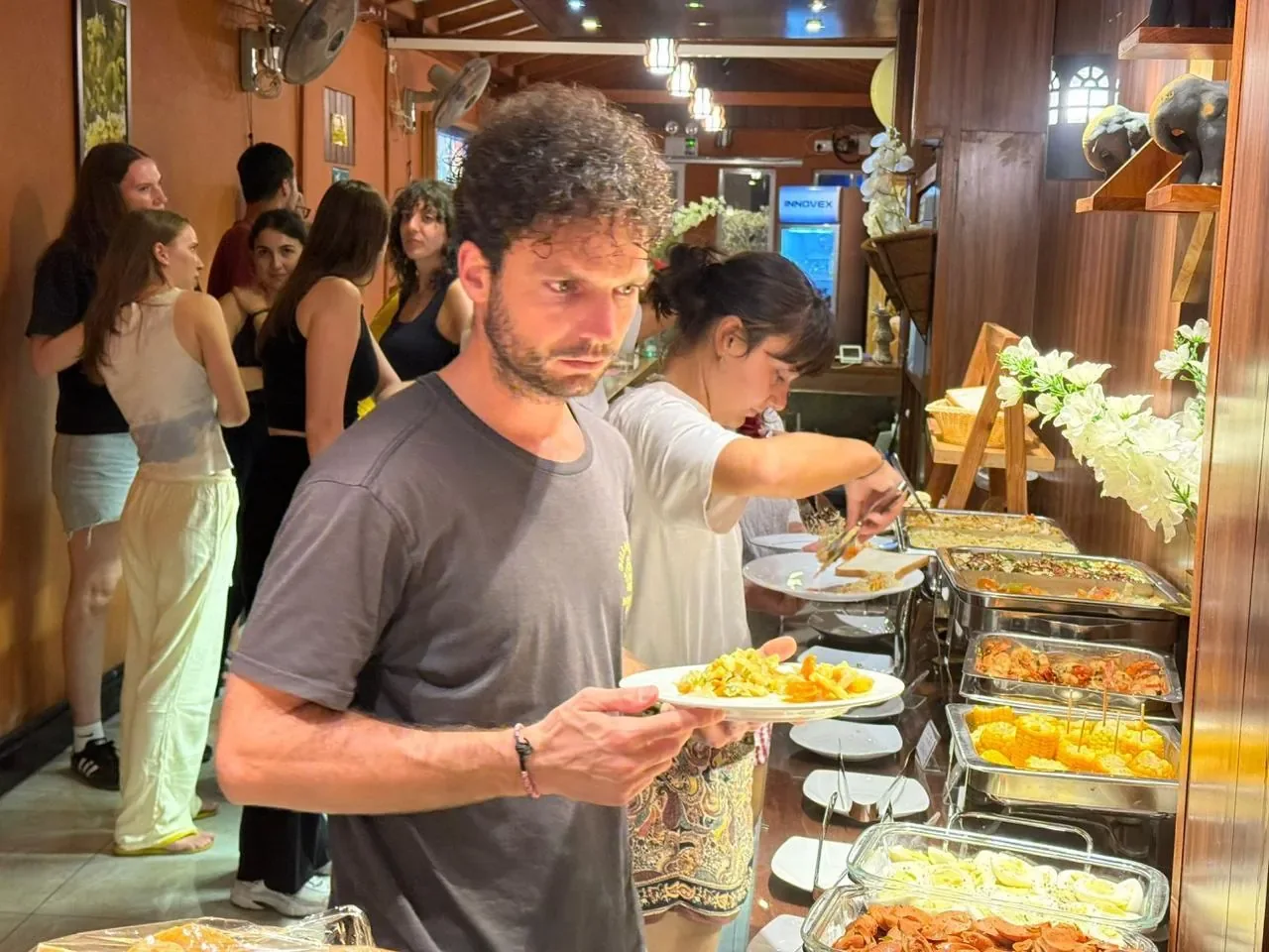 Guests serving themselves at buffet