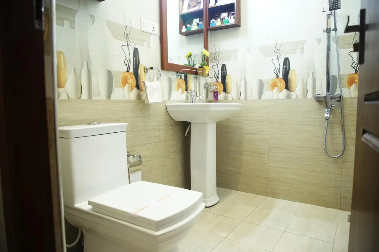 Clean private shower with hot water and modern fixtures