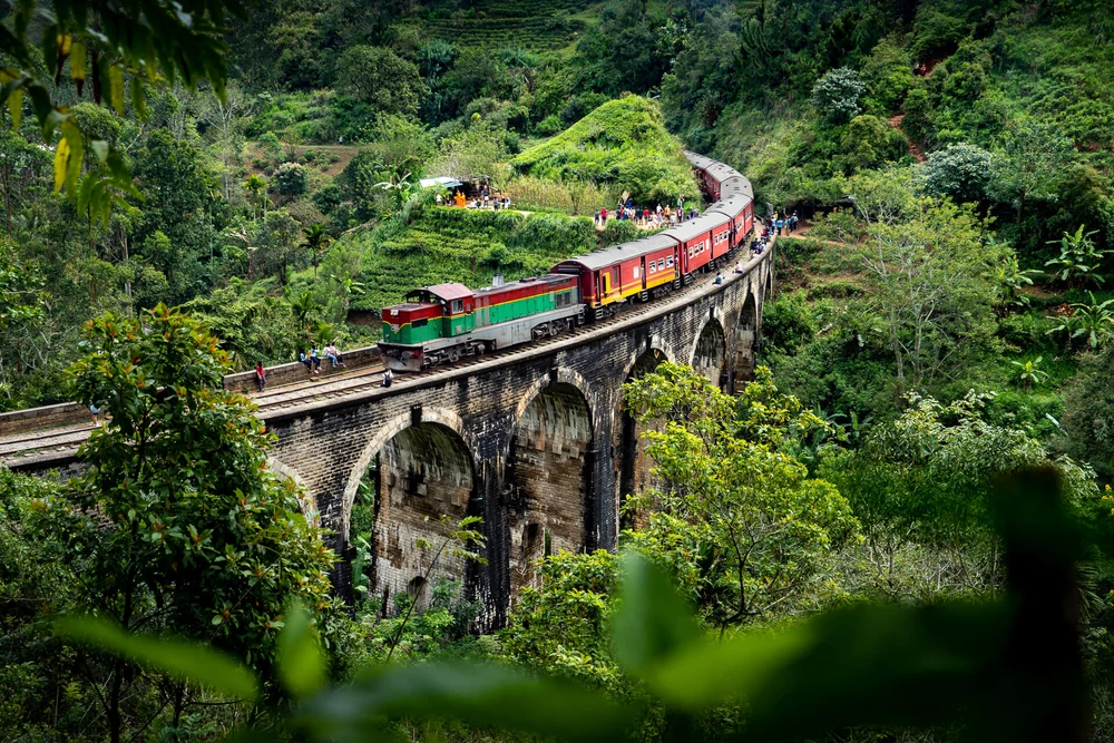 Train crossing Nine Arch Bridge in Ella, Sri Lanka